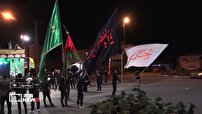 پرچم عظیم عزای حسینی بر فراز بیله سوار در استان اردبیل
